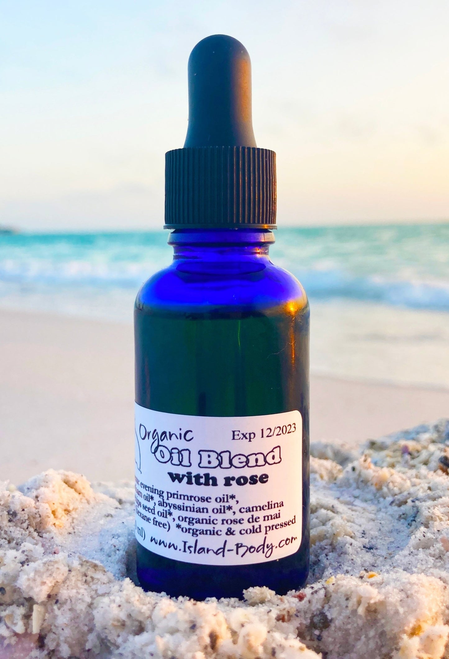 organic rose face oil rose oil for face in blue glass dropper bottle