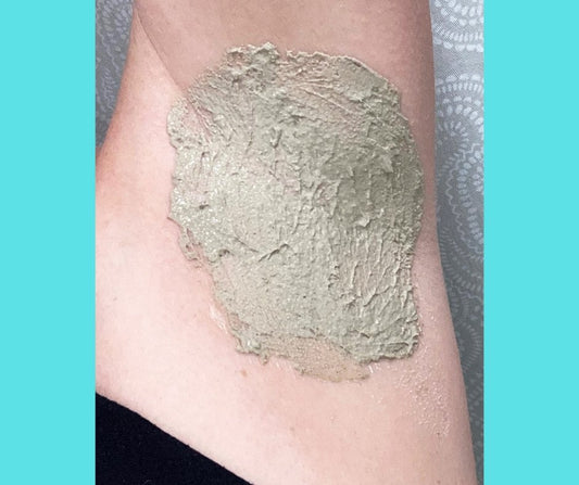 bentonite clay armpit detox mask applied to underarm during natural deodorant transition