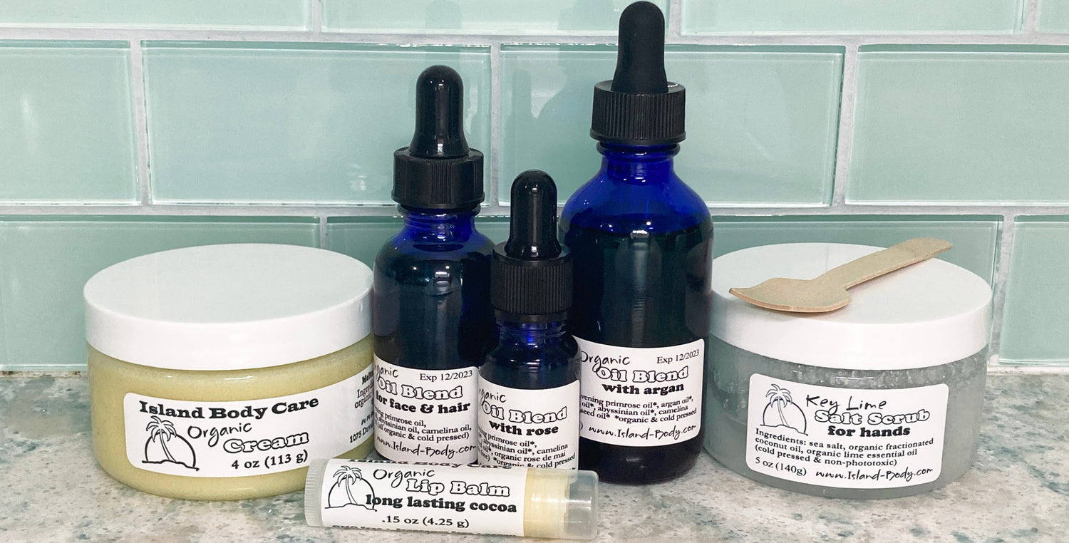 Island Deodorant organic body care collection featuring lip balm, oil blends, body cream, and salt scrub made with clean, natural ingredients