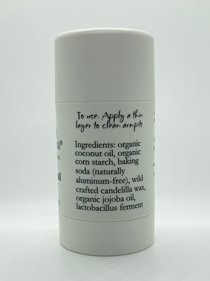 Close-up view of Island Deodorant Original formula ingredients including organic coconut oil, baking soda, candelilla wax, jojoba oil, and probiotics