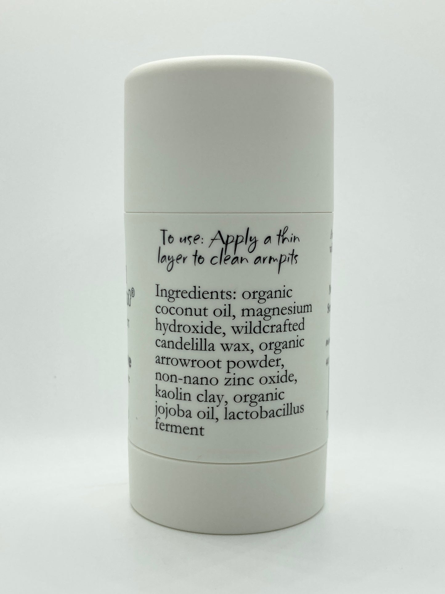 Island Deodorant Sensitive baking soda free natural deodorant with probiotics in white stick container.