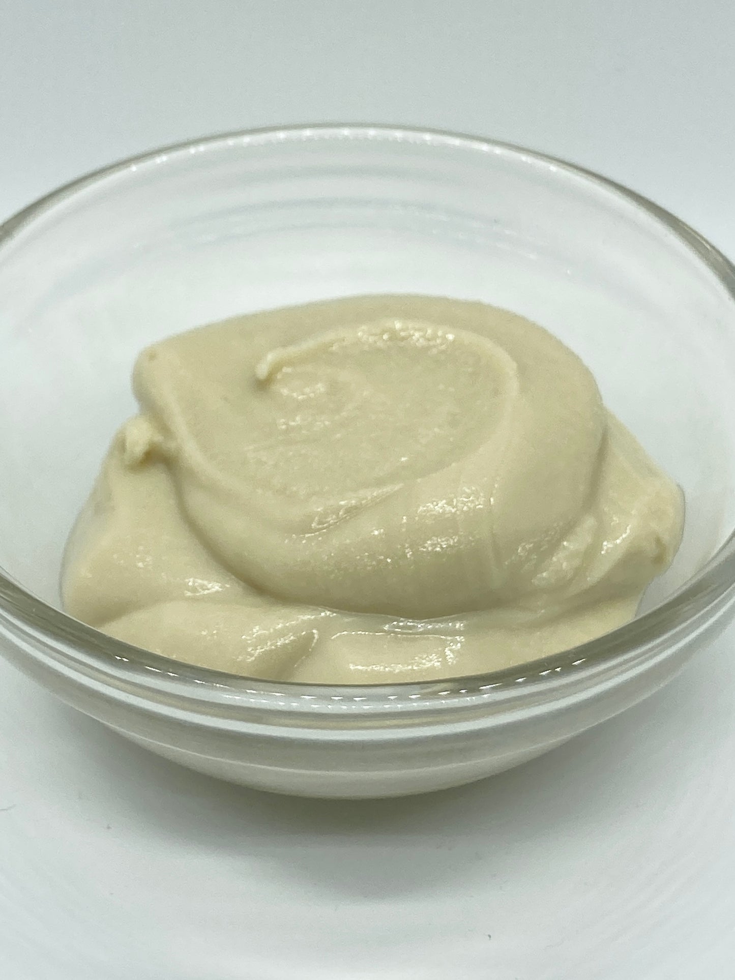 Sensitive Clear deodorant cream refill with zinc ricinoleate shown as smooth baking soda free deodorant cream