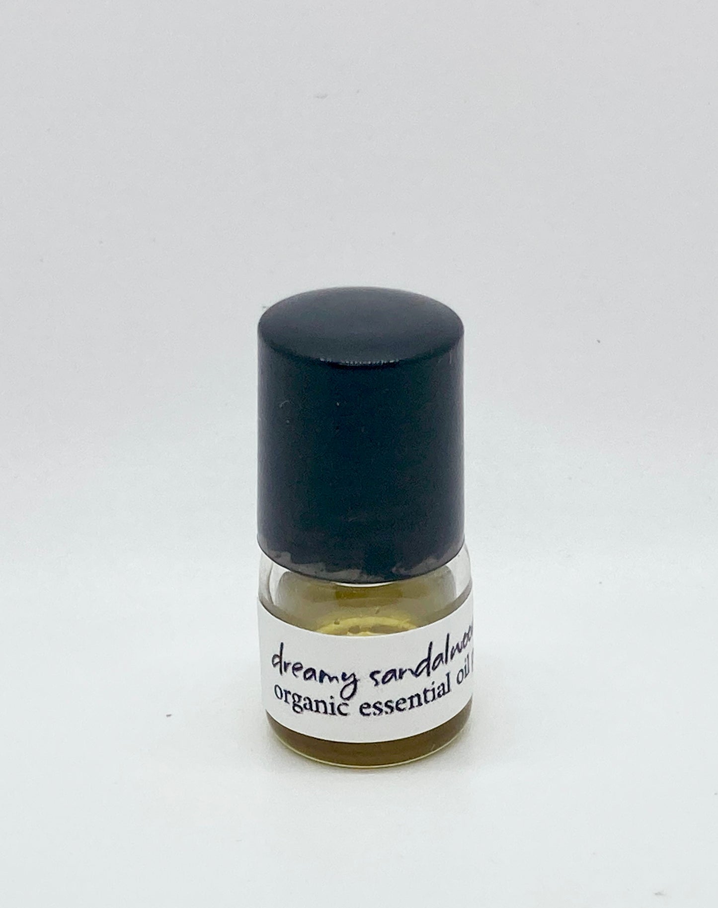 1ml sample bottle of Dreamy Sandalwood Tonka essential oil perfume – natural oil-based perfume by Island Deodorant