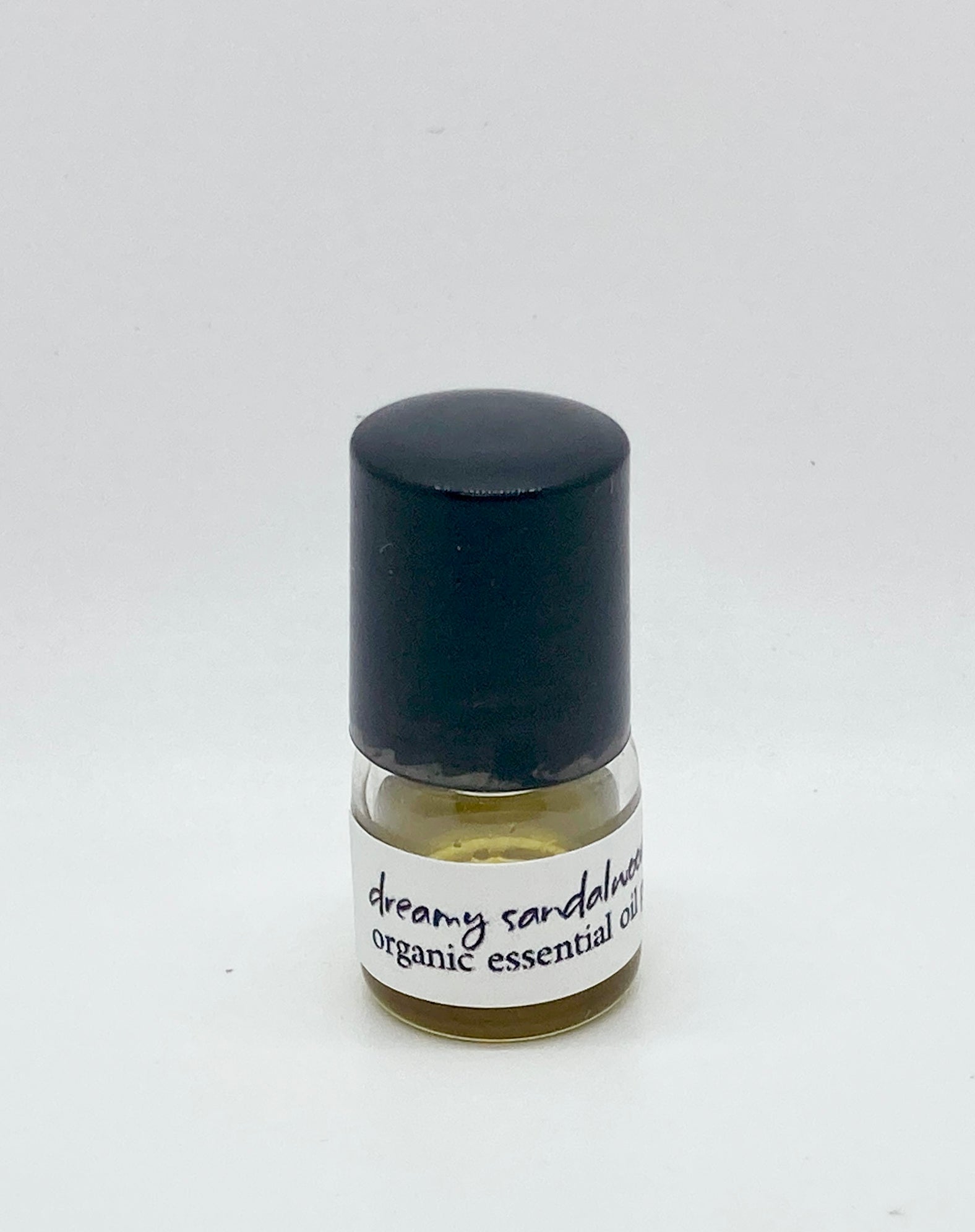 1ml sample bottle of Dreamy Sandalwood Tonka essential oil perfume – natural oil-based perfume by Island Deodorant
