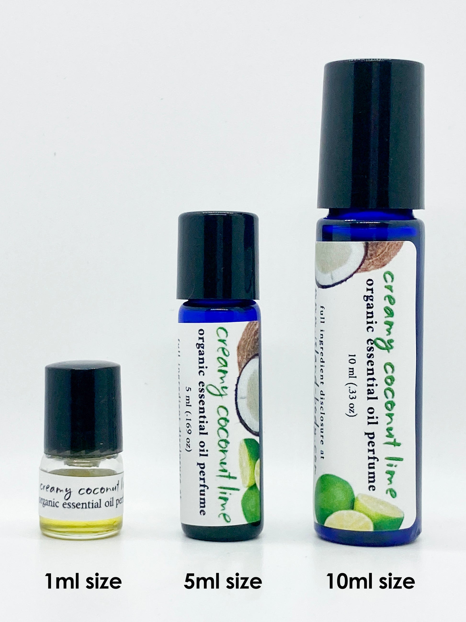 Three bottles of Creamy Coconut Lime essential oil perfume in 1ml, 5ml, and 10ml sizes displayed against a white background, showing the different blue glass roll-on container options.